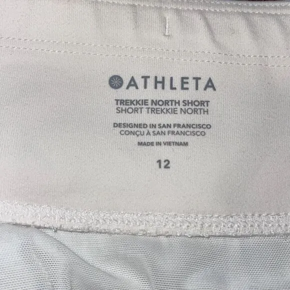Athleta Athletic Trekkie North Shorts Off White Print Stretch Zip Pockets 12