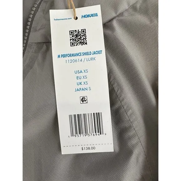 HOKA ONE ONE Woman’s XS Performance shield jacket long sleeves front Grey Lurk