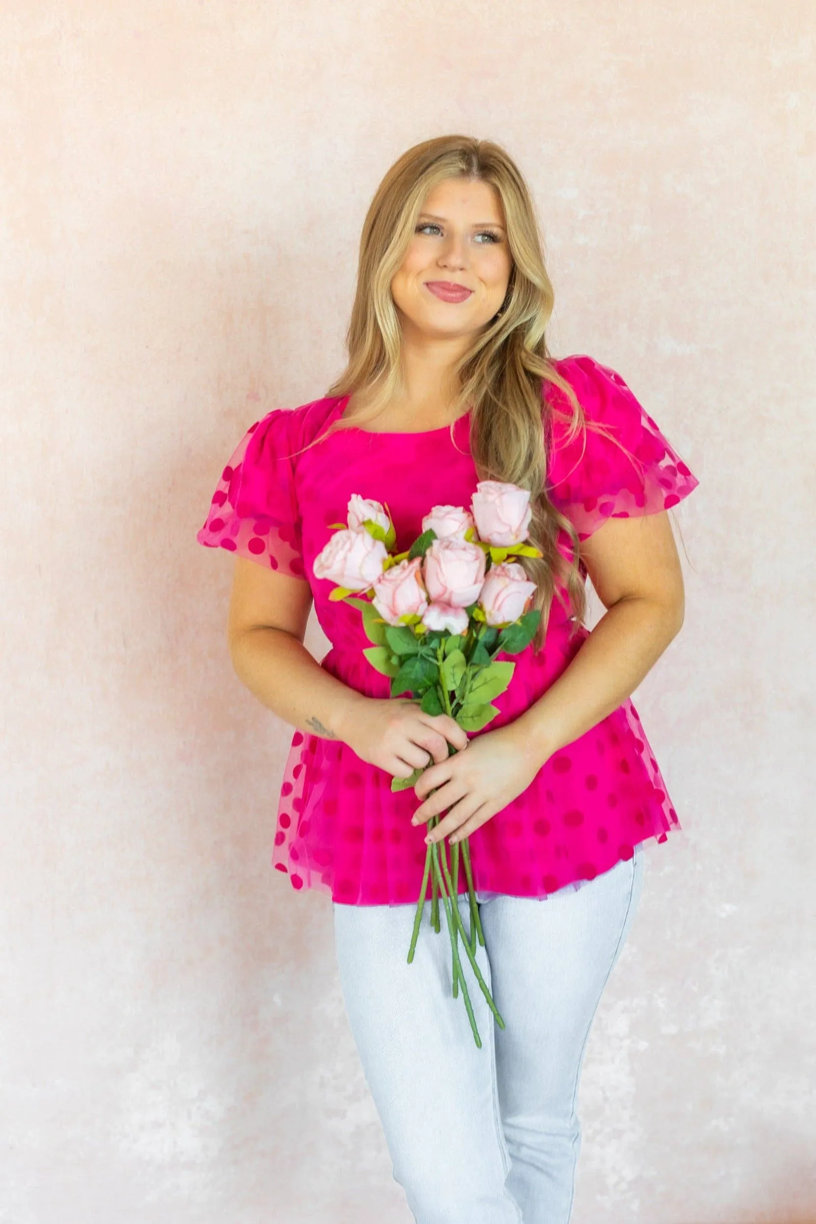 Pink polka dot mesh peplum top
