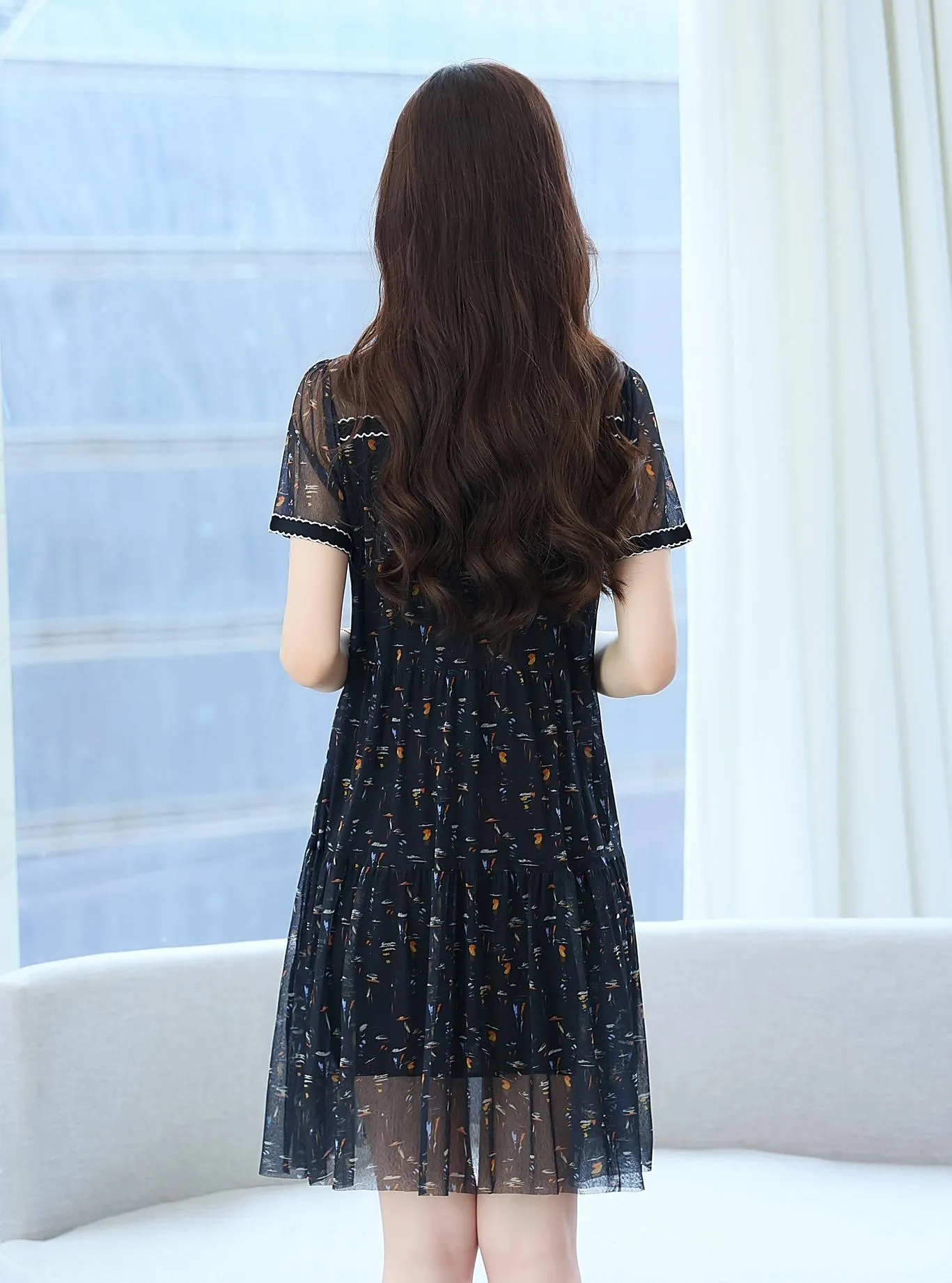 Sheer Mid-length Mesh Dress with a Flattering Fit