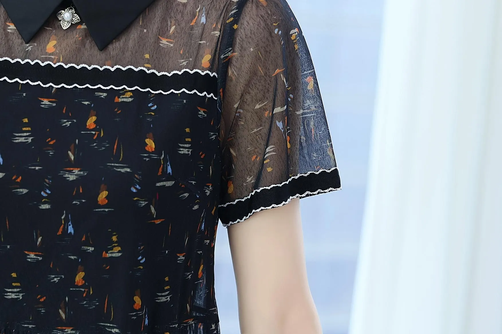 Sheer Mid-length Mesh Dress with a Flattering Fit