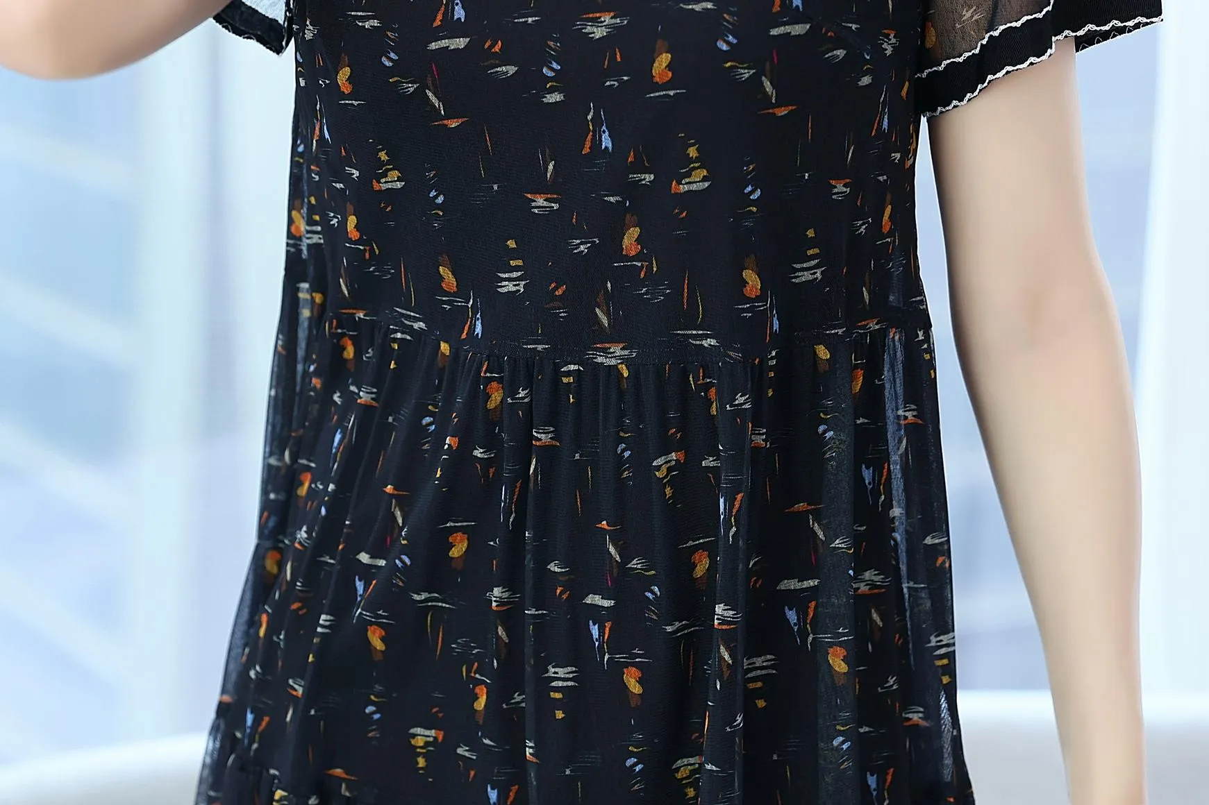 Sheer Mid-length Mesh Dress with a Flattering Fit