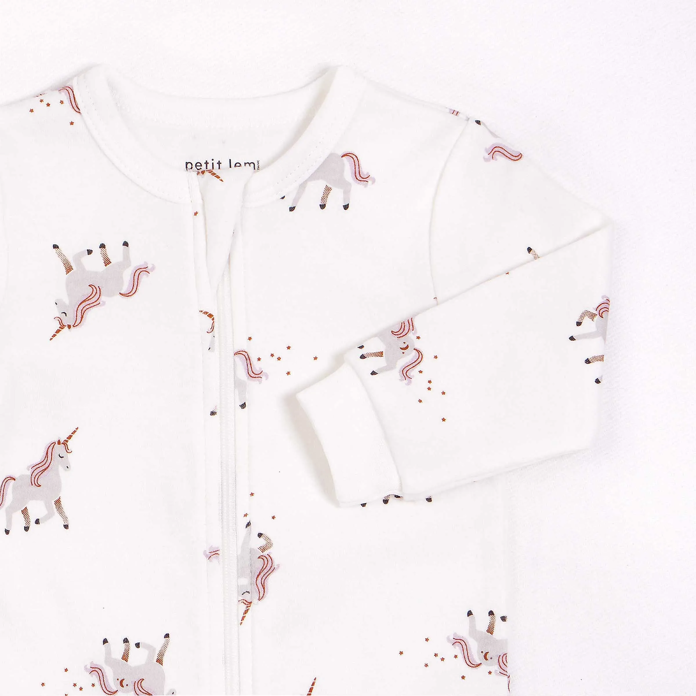 Unicorn Print on Off-White Footed Sleeper